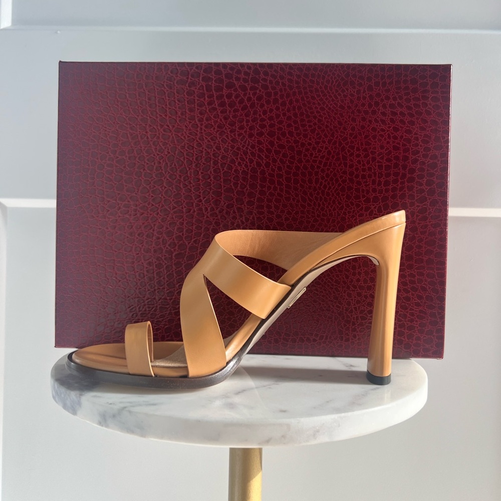 Tamara Mellon Tan High Heeled Sandals with Sleek Design and Asymmetrical Straps